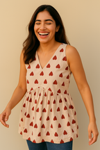Sleeveless Peplum Top – Floral Printed Cotton